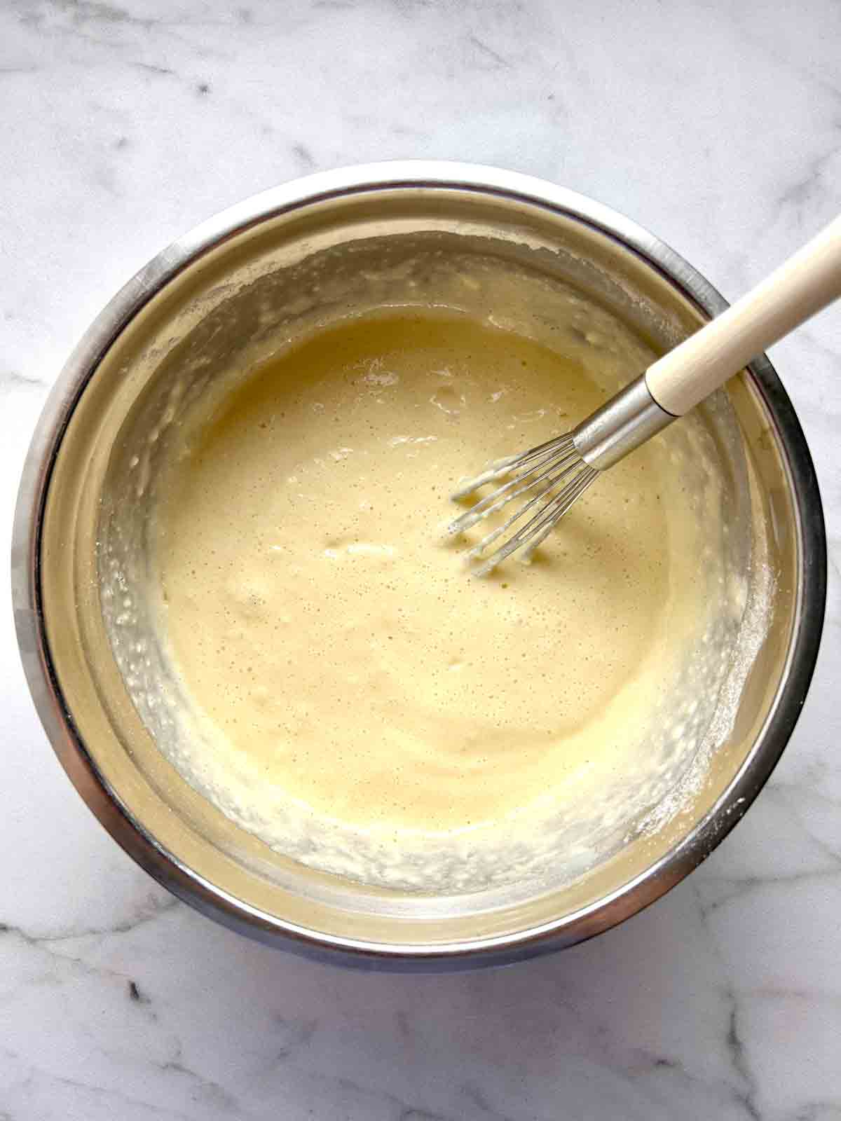 batter being whisked in bowl.