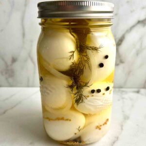 pickled eggs in jar.