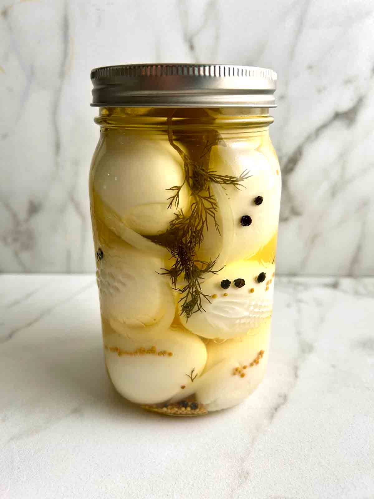 pickled eggs in jar.
