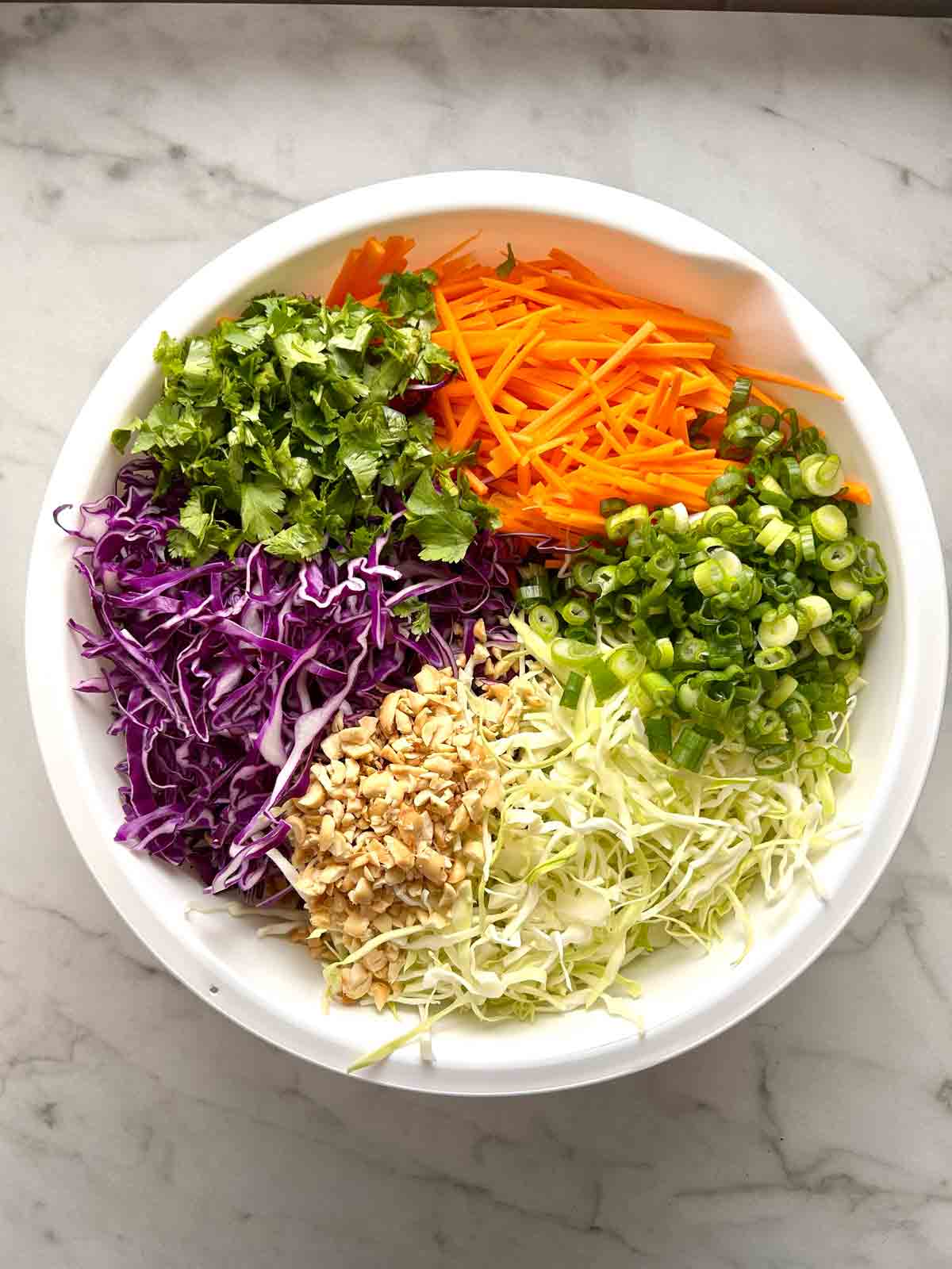 salad components in large bowl.