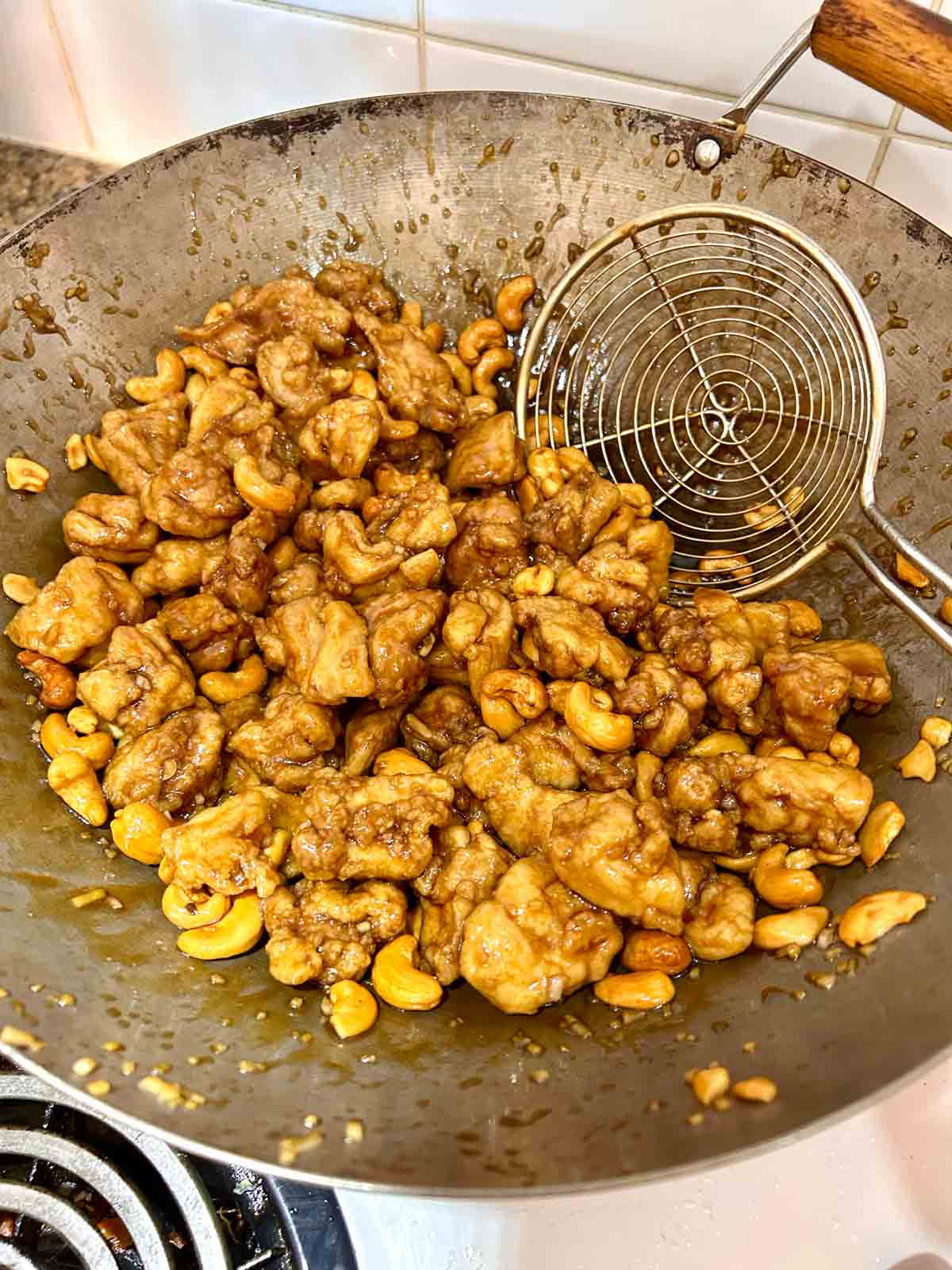 add chicken back to wok.