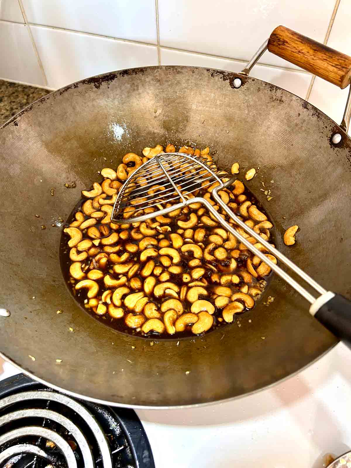 sauce simmering in wok.