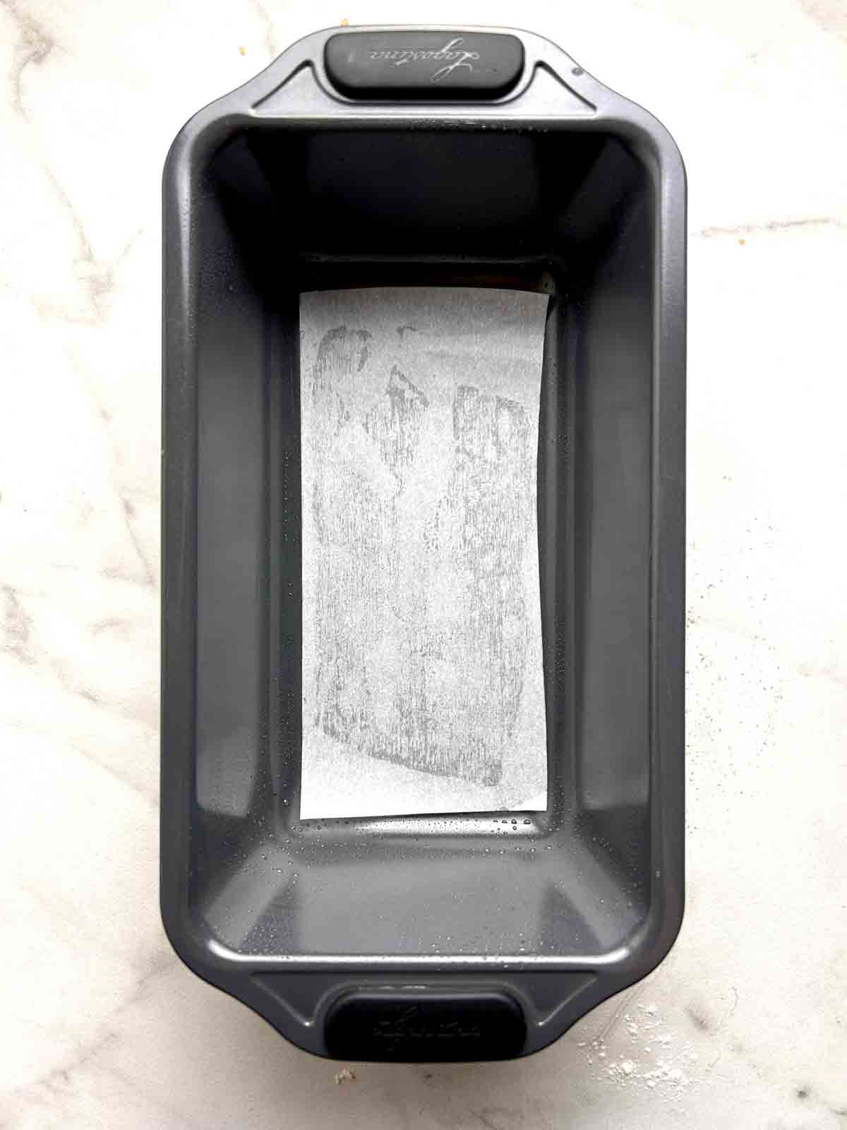 parchment paper on bottom of bread pan.