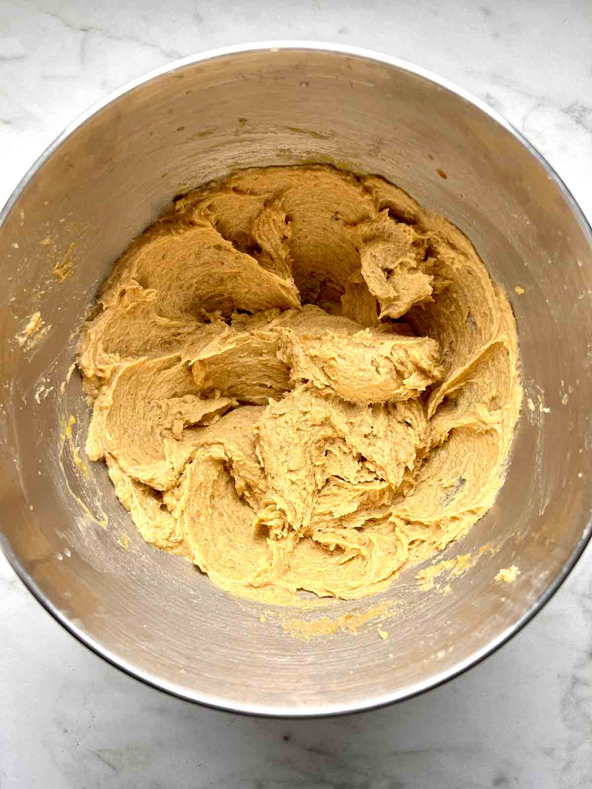 eggs mixed into butter and sugar.