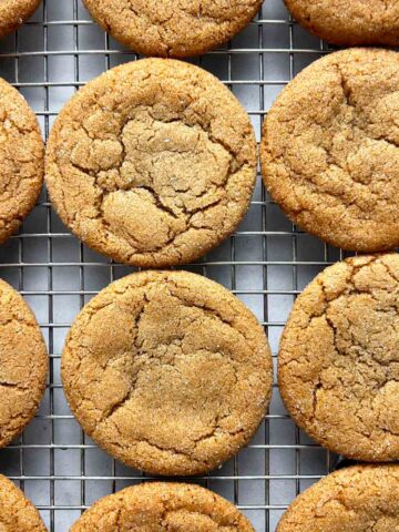 close up of brown sugar cookies cooling on wire rack.