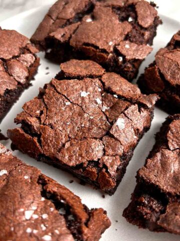 close of up sliced brownies on plate.
