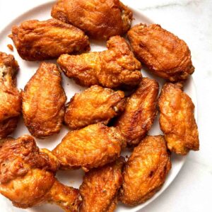 close up of fried chicken wings.
