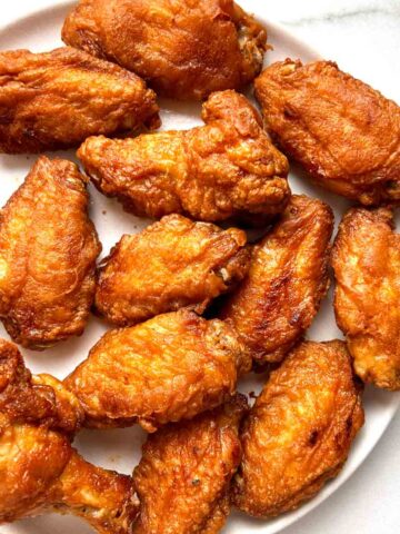 close up of fried chicken wings.