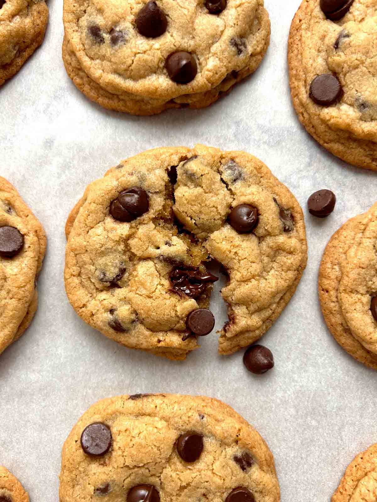 cookie being split apart to show the melty inside.