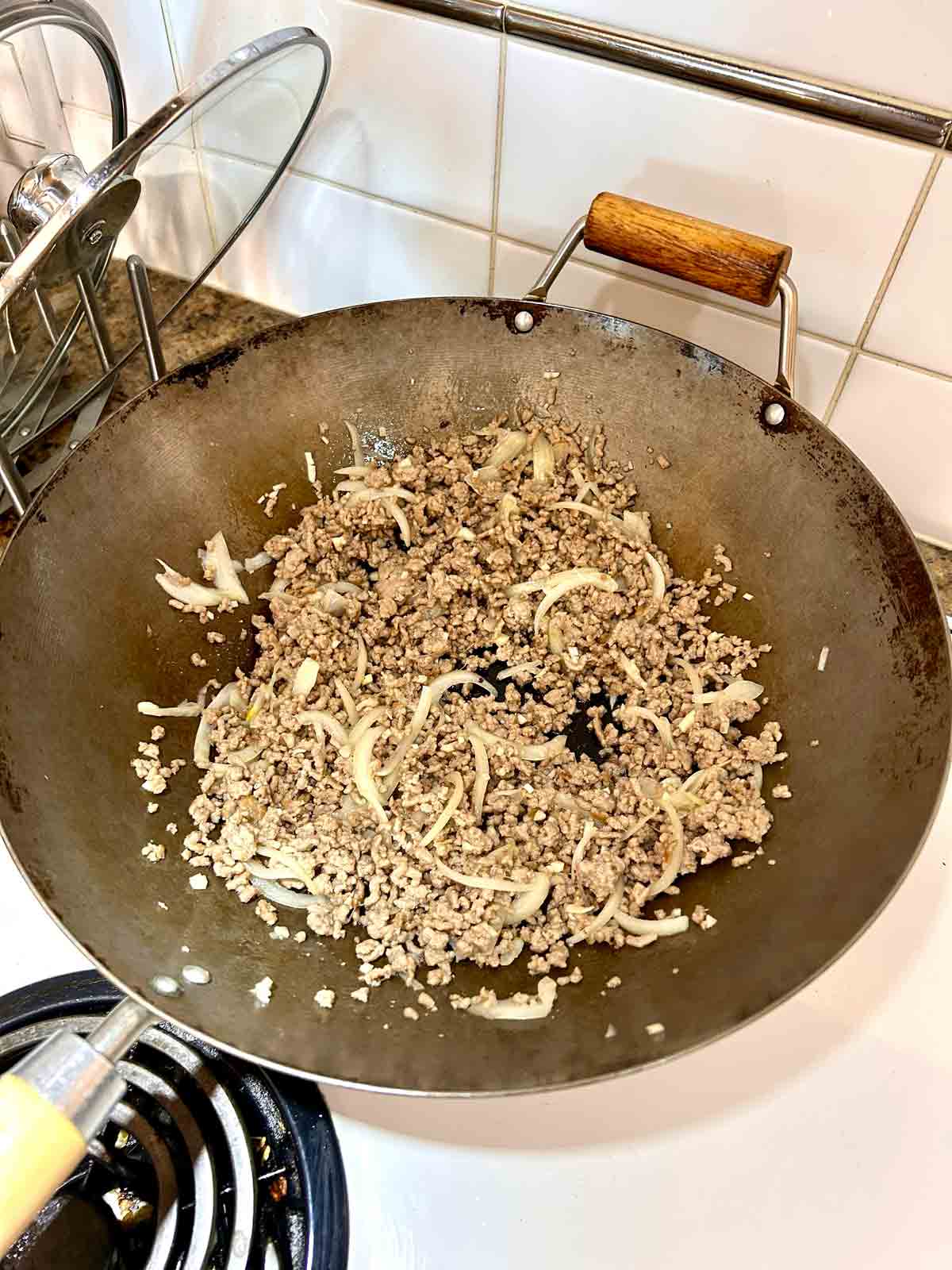 onions and garlic added to pork.