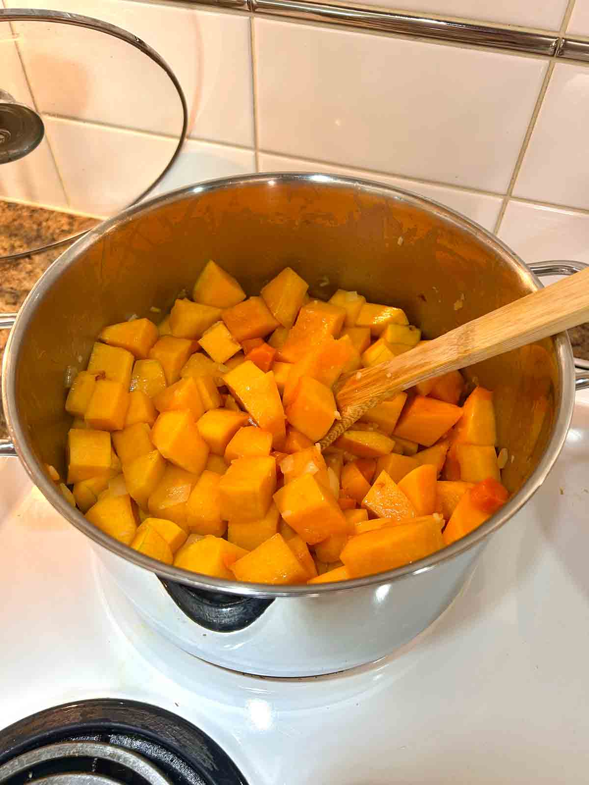 carrots and squash added to pot.
