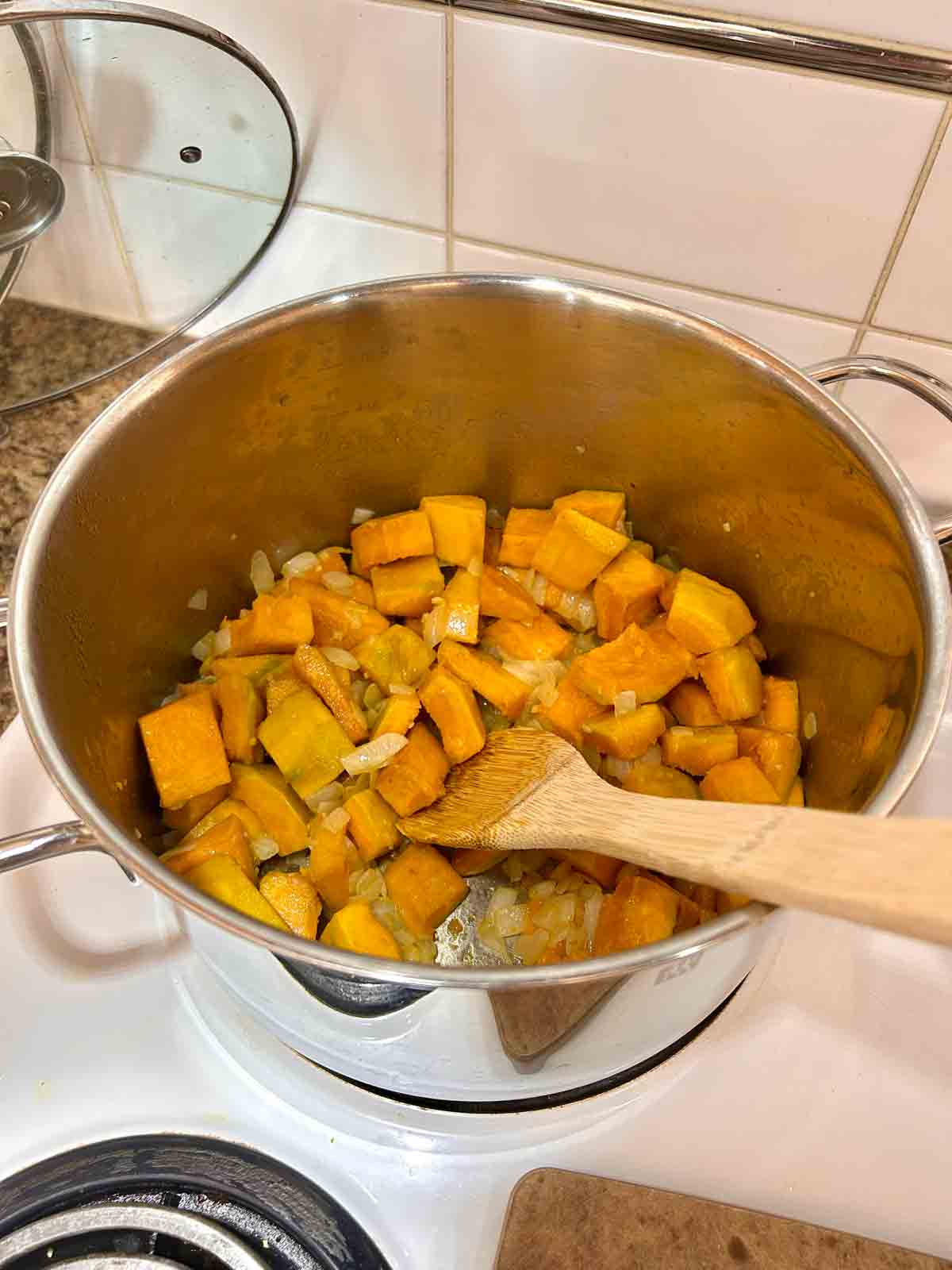 chopped pumpkin cooked in pot.