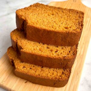 3 slices of sweet potato bread stacked on top of each other.
