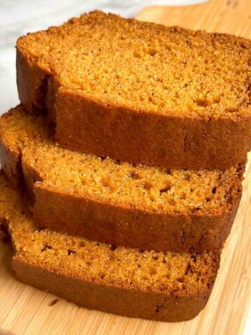 3 slices of sweet potato bread stacked on top of each other.