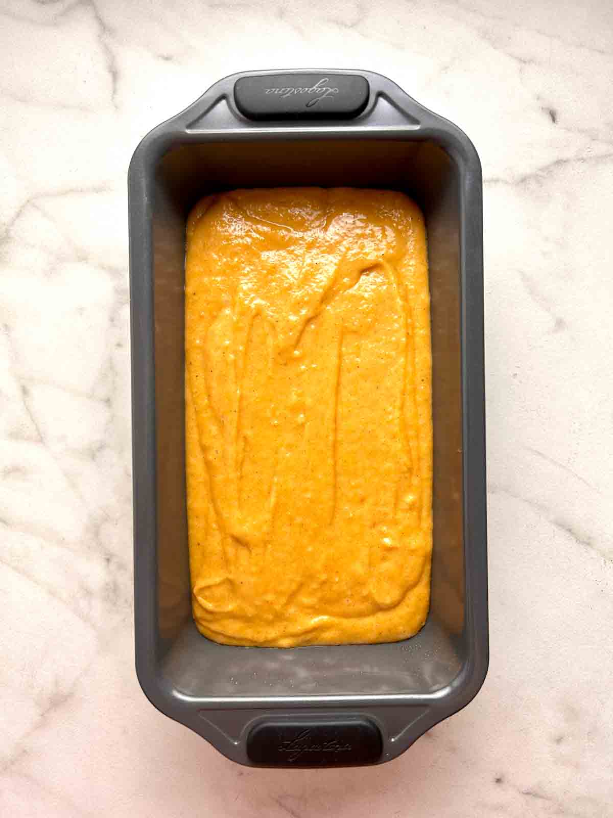 batter spread into loaf pan.