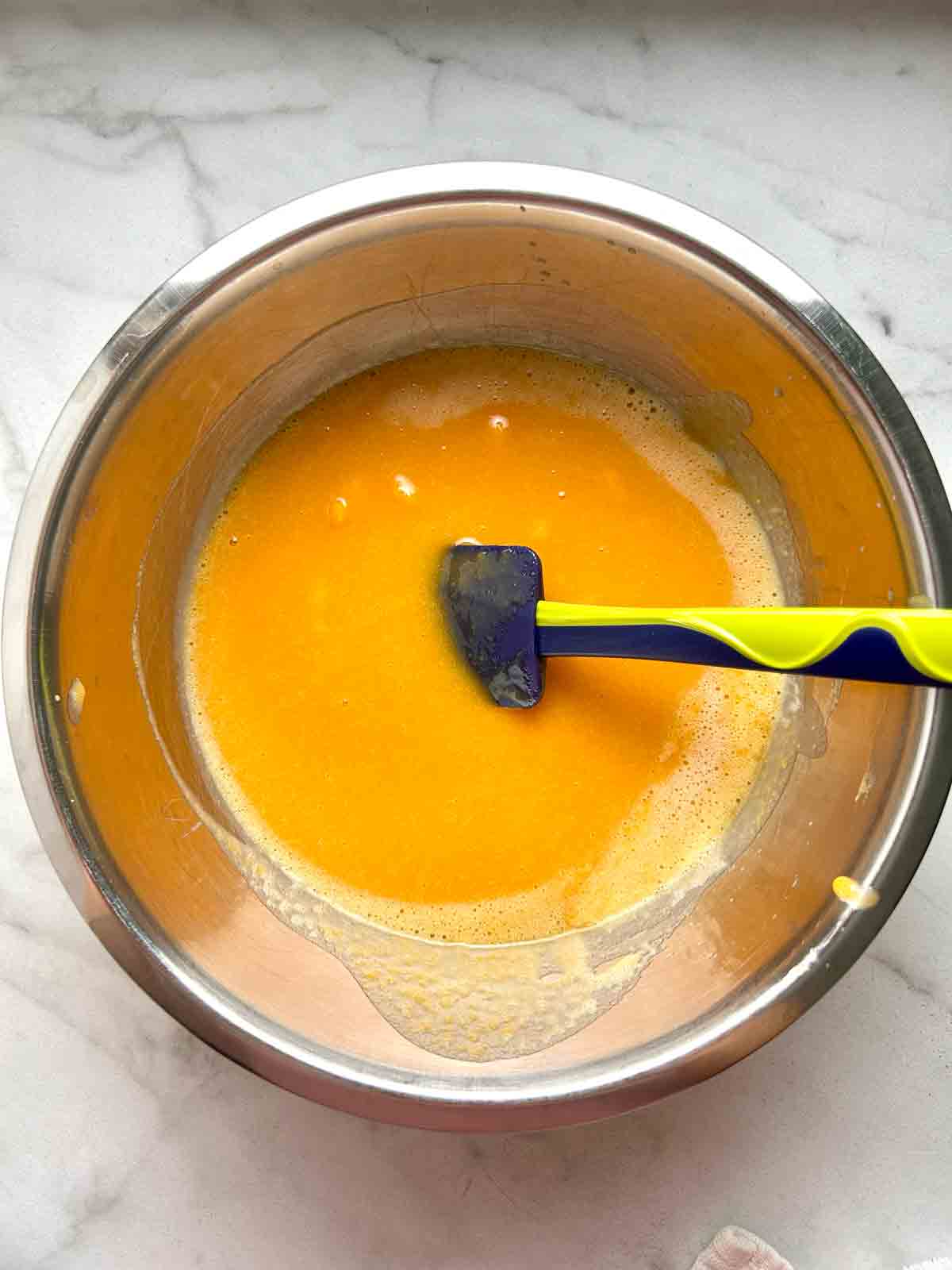 wet ingredients mixed in bowl.