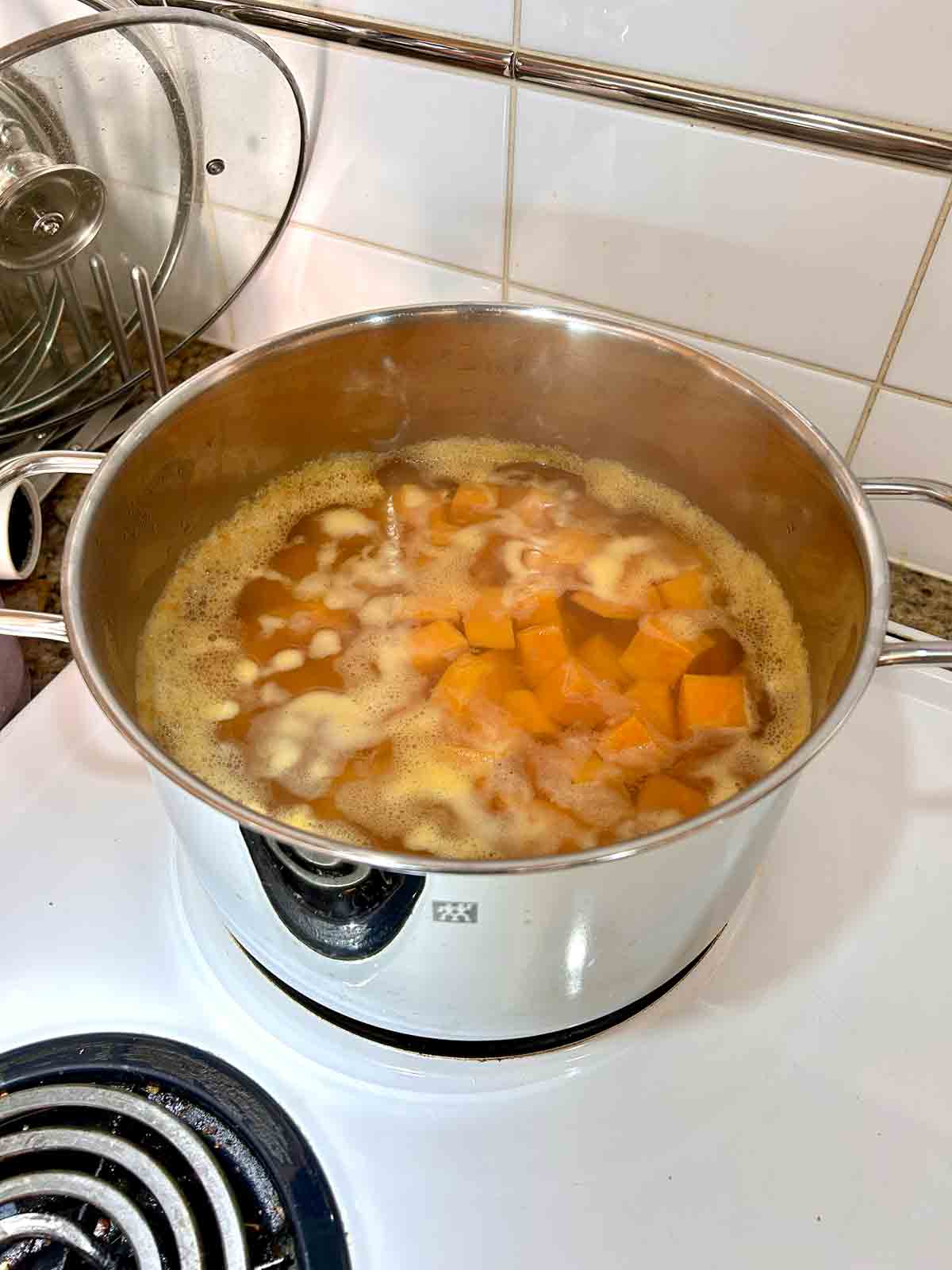 sweet potatoes boiling in water.