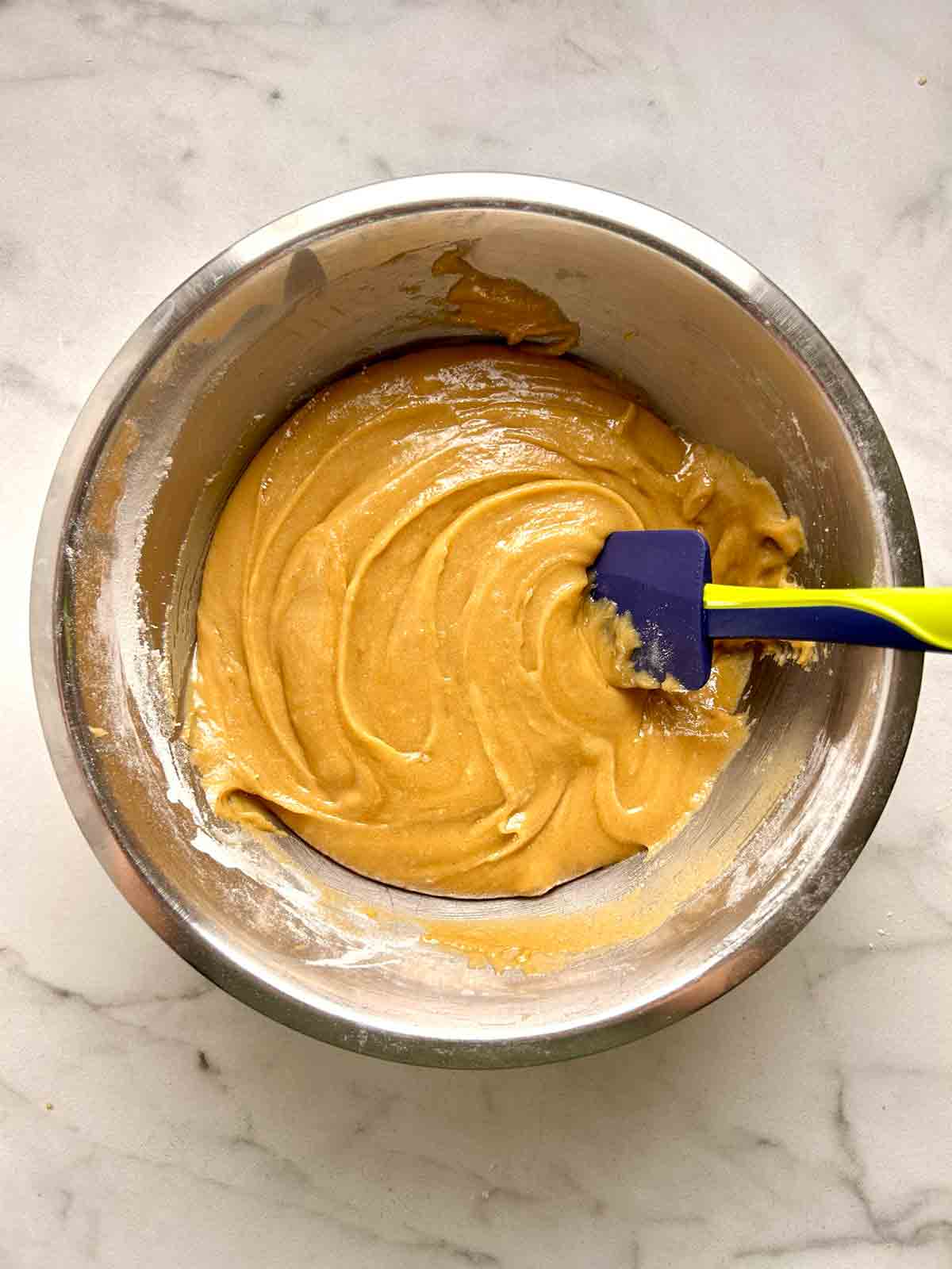 dry mixture whisked into wet mixture.