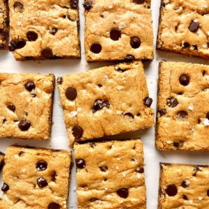 overhead shot of slices of blondies on parchment paper.