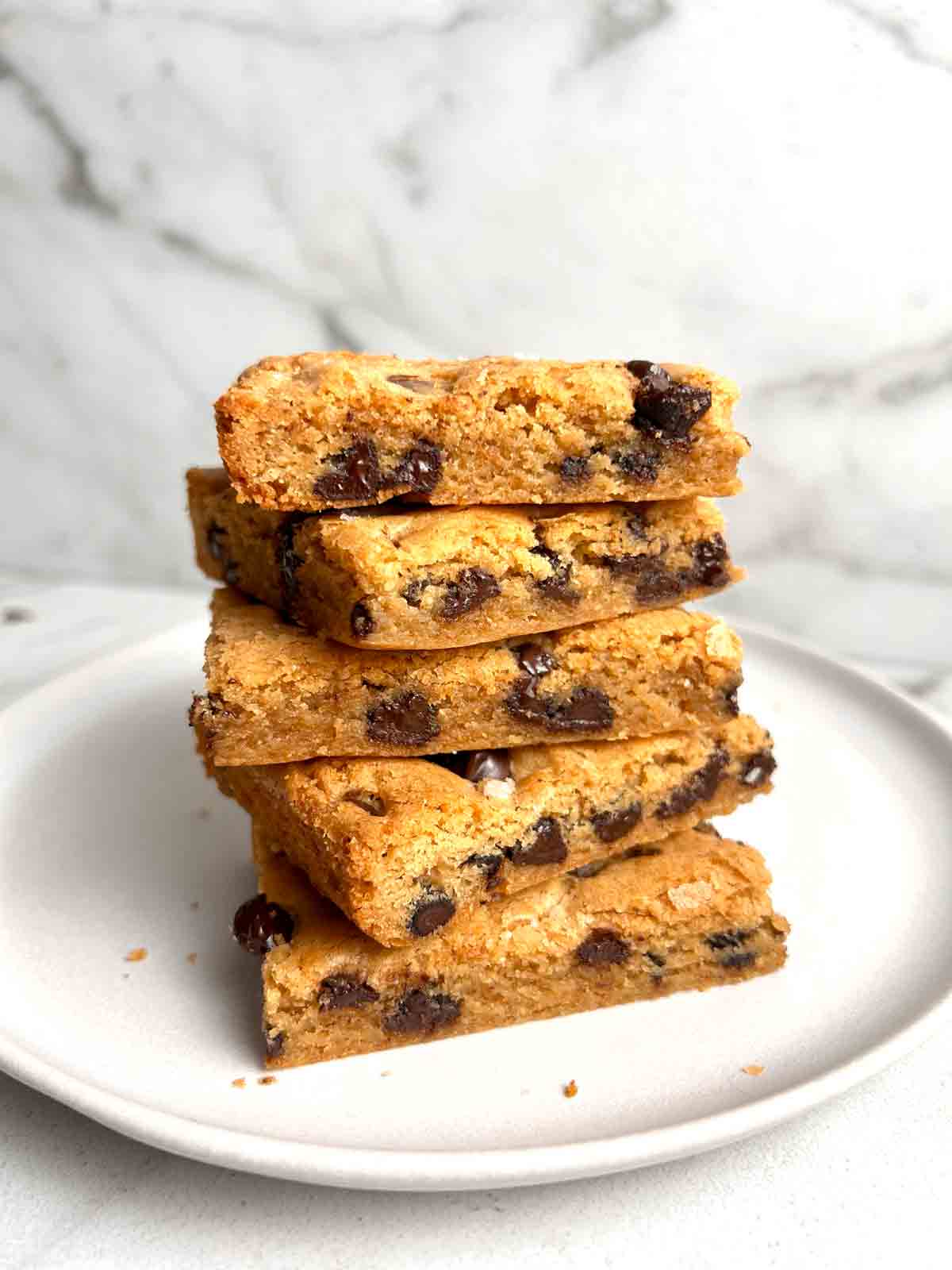 stack of blondies on plate.