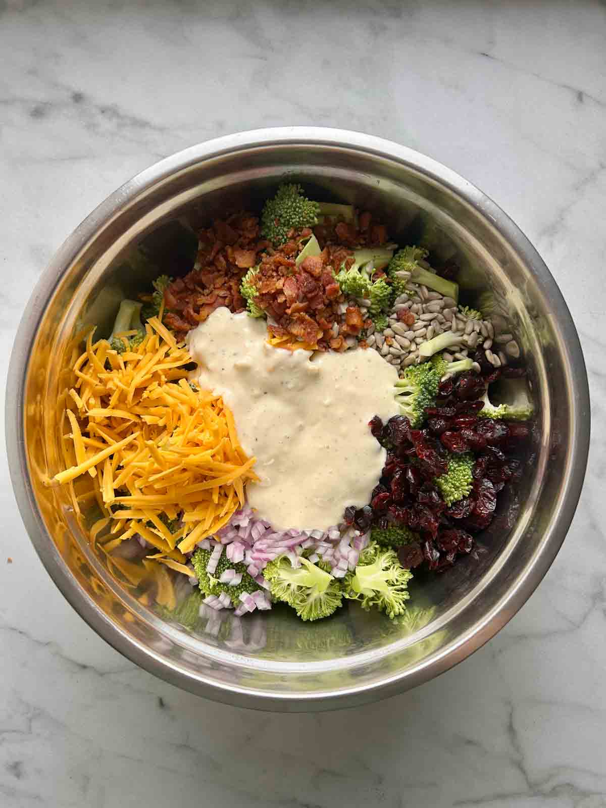 dressing poured over ingredients.