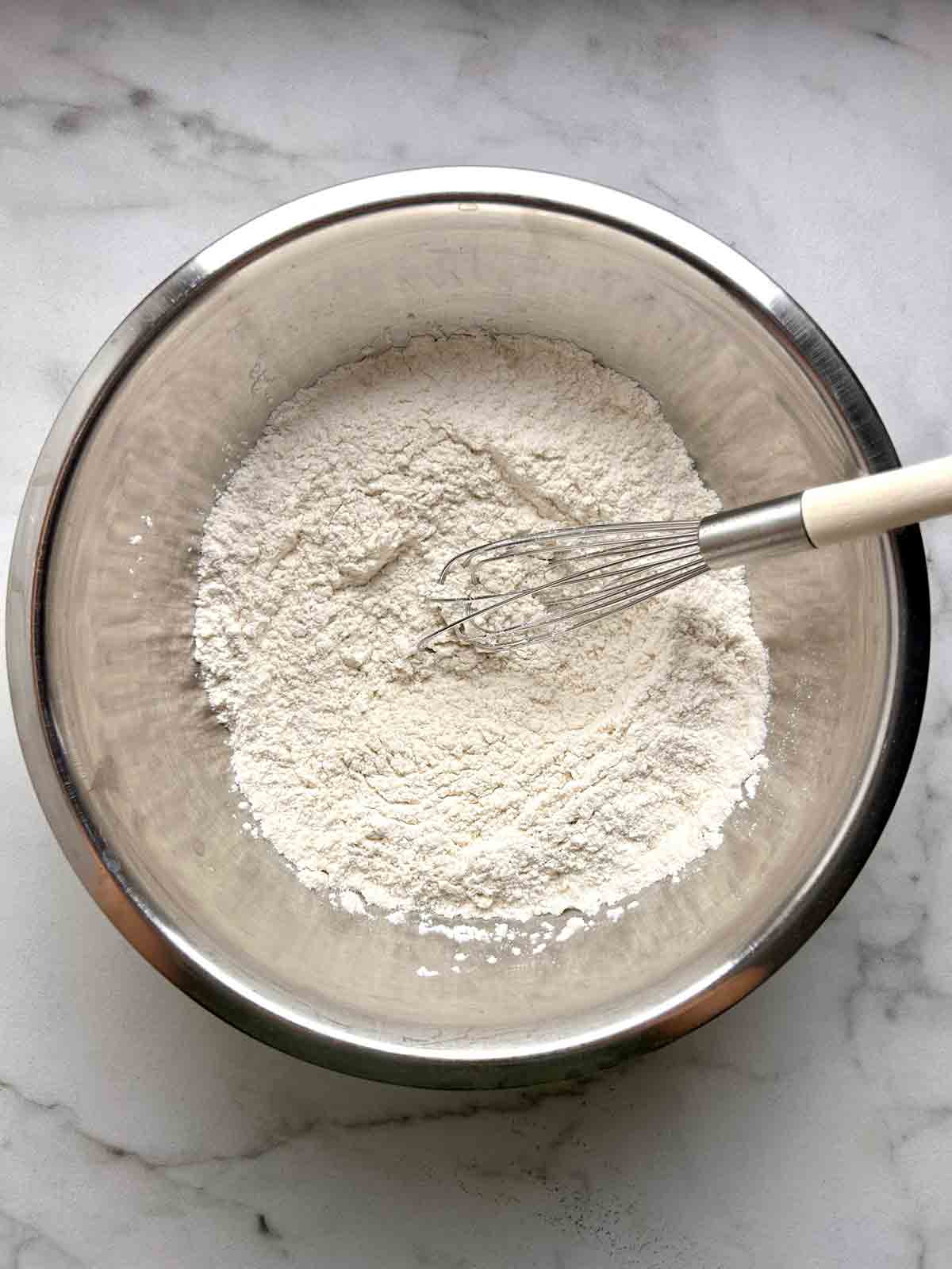 flour mixture whisked in bowl.