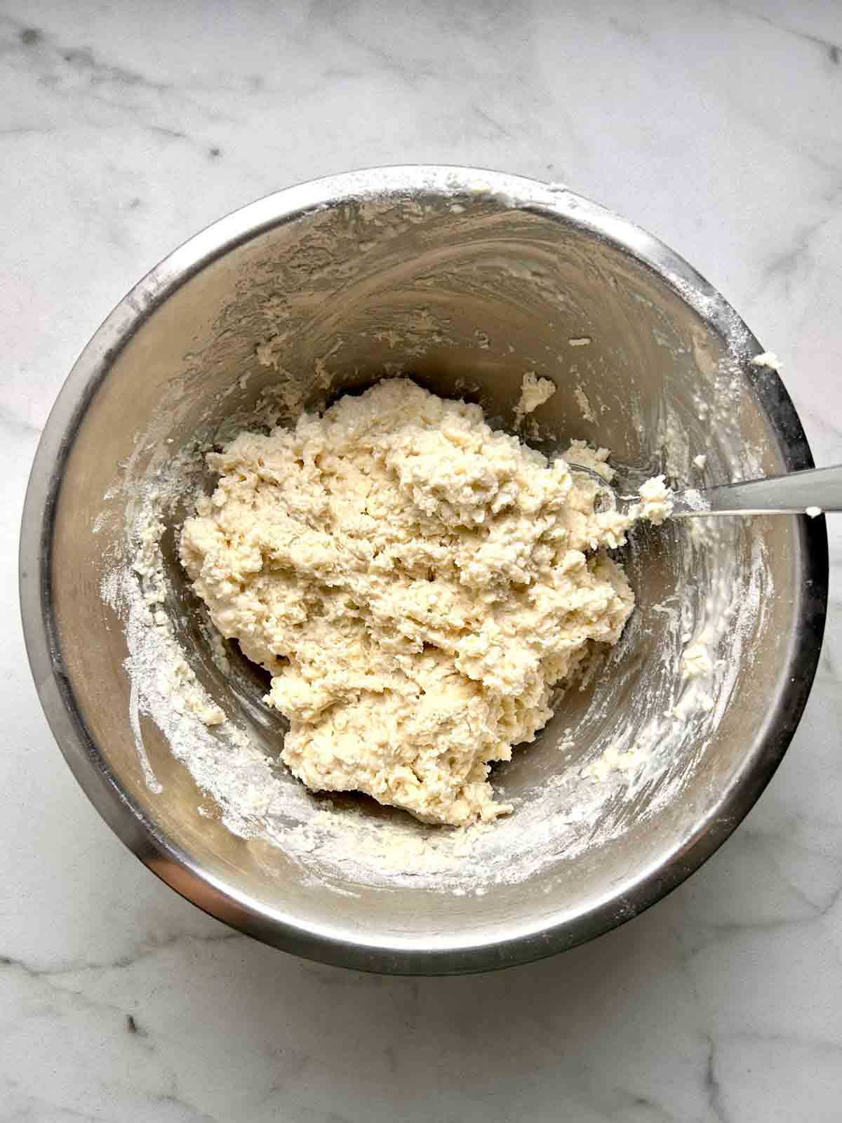 sticky dough mixed until just combined in bowl.