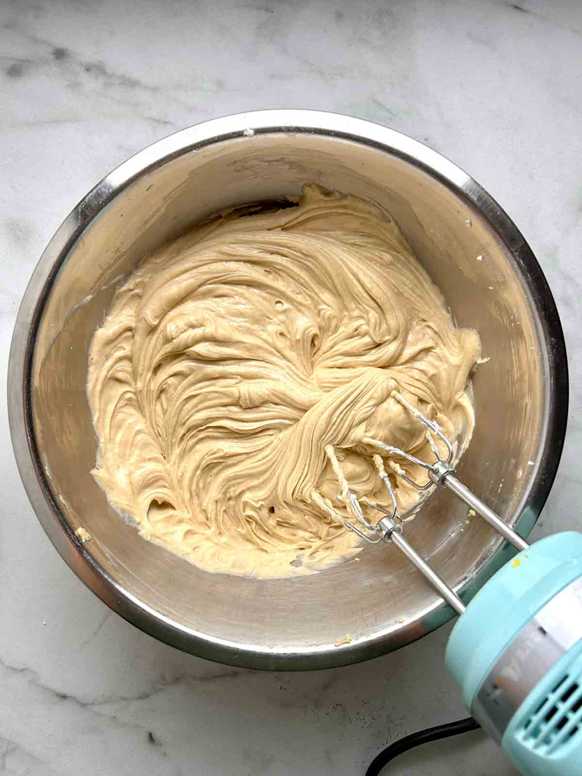 cream, peanut butter, and vanilla beaten into filling mixture.