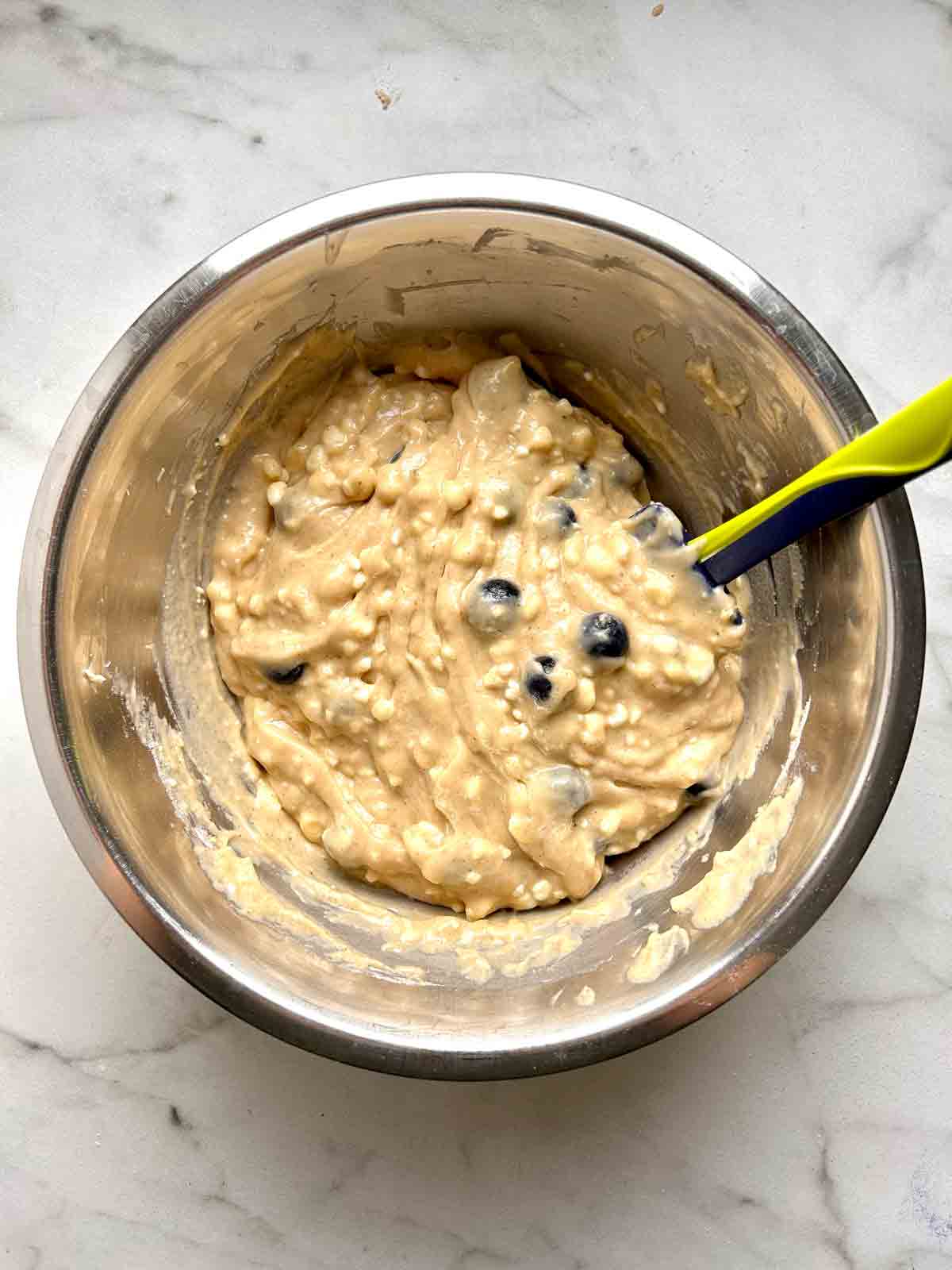 blueberries folded into batter.