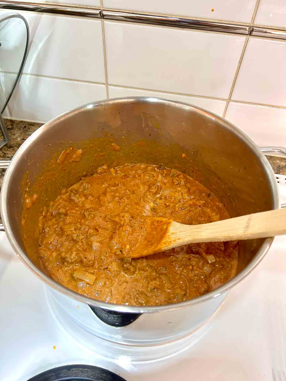 cheese stirred into sauce.