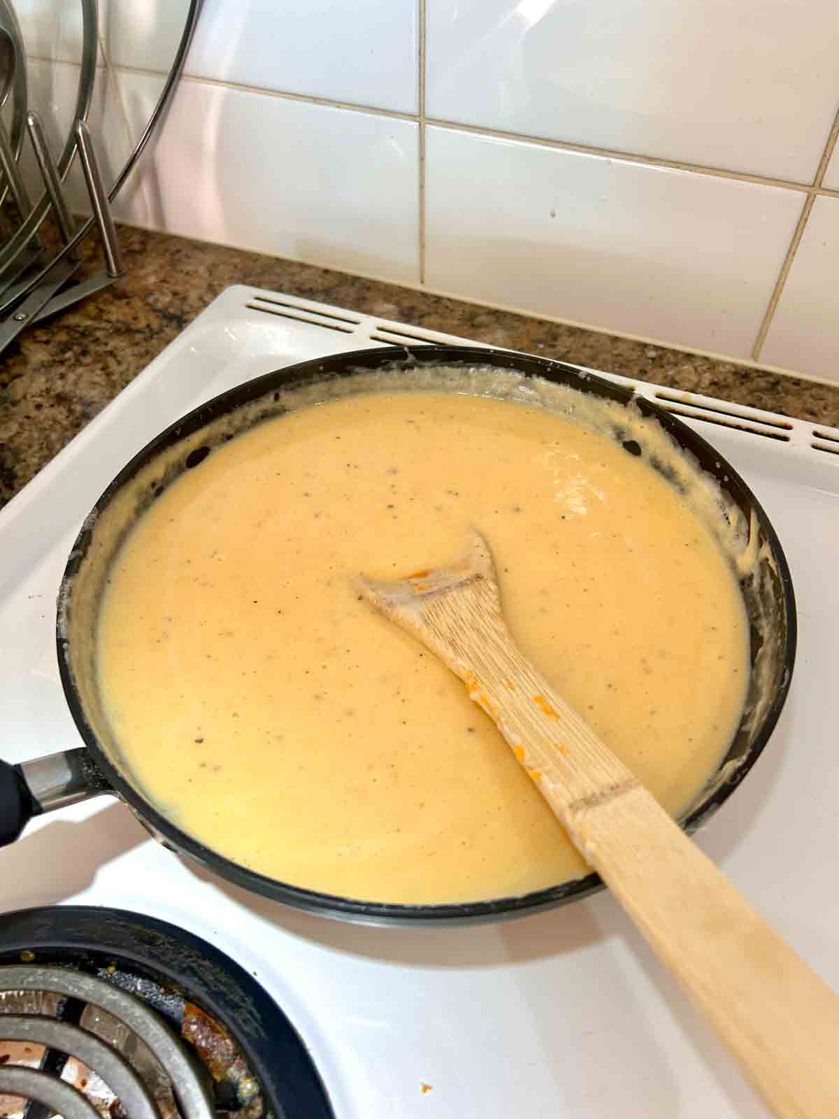cheddar cheese added to sauce.