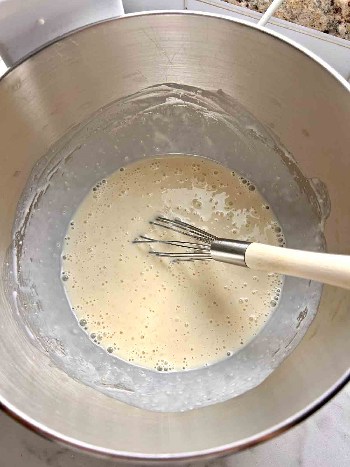 wet ingredients whisked in stand mixer bowl.