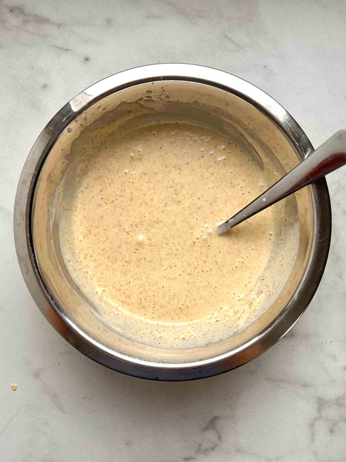 dressing mixed in bowl.