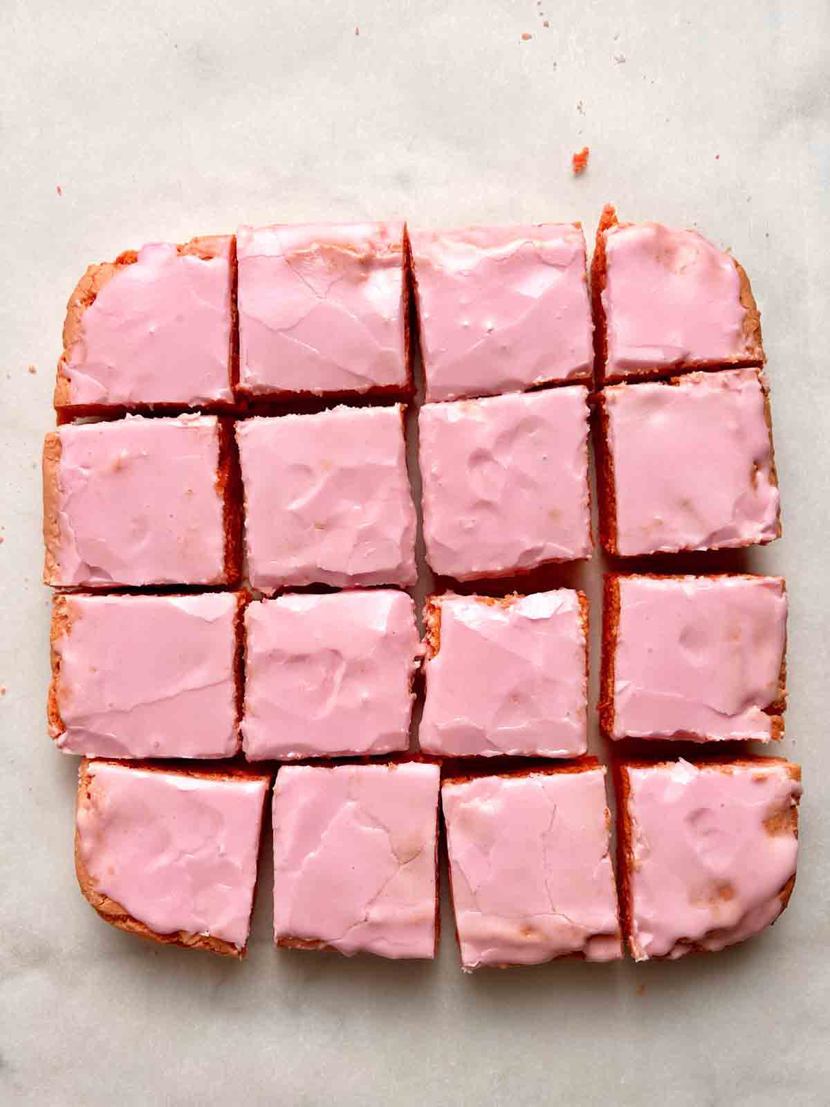 strawberry brownies cut into 16 pieaces.