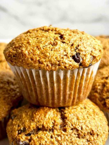 close up of stack of bran muffins.