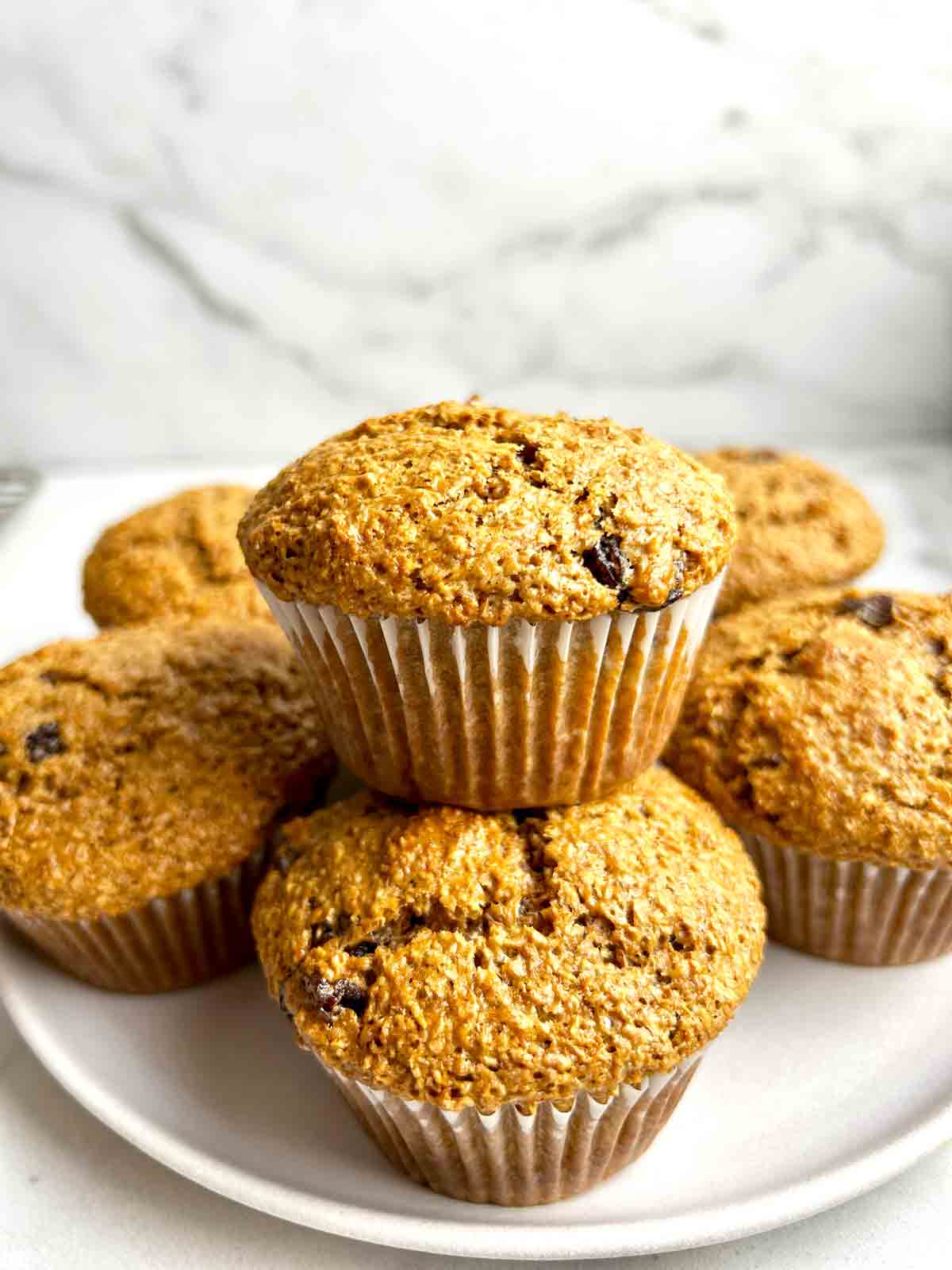 close up of stack of bran muffins.