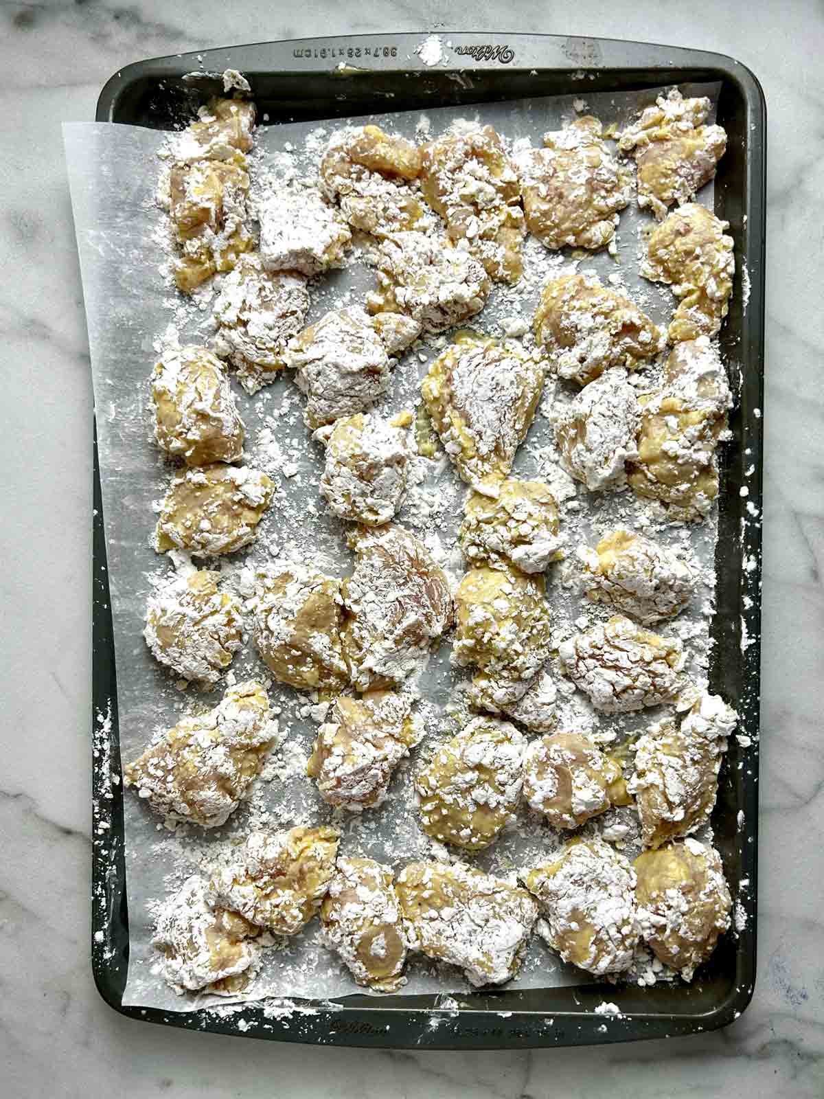 chicken coated in cornstarch.