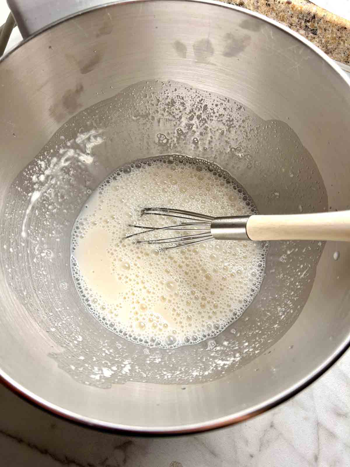 wet mixture whisked in bowl.