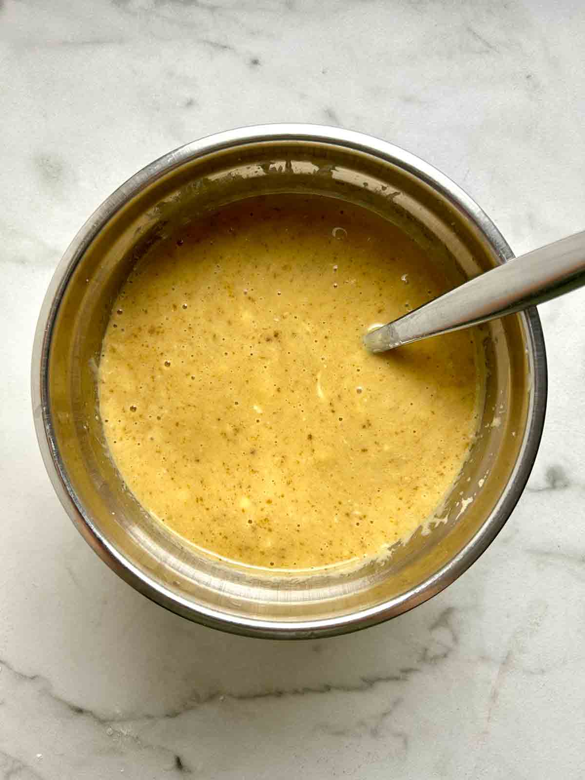 wet ingredients mixed in bowl.