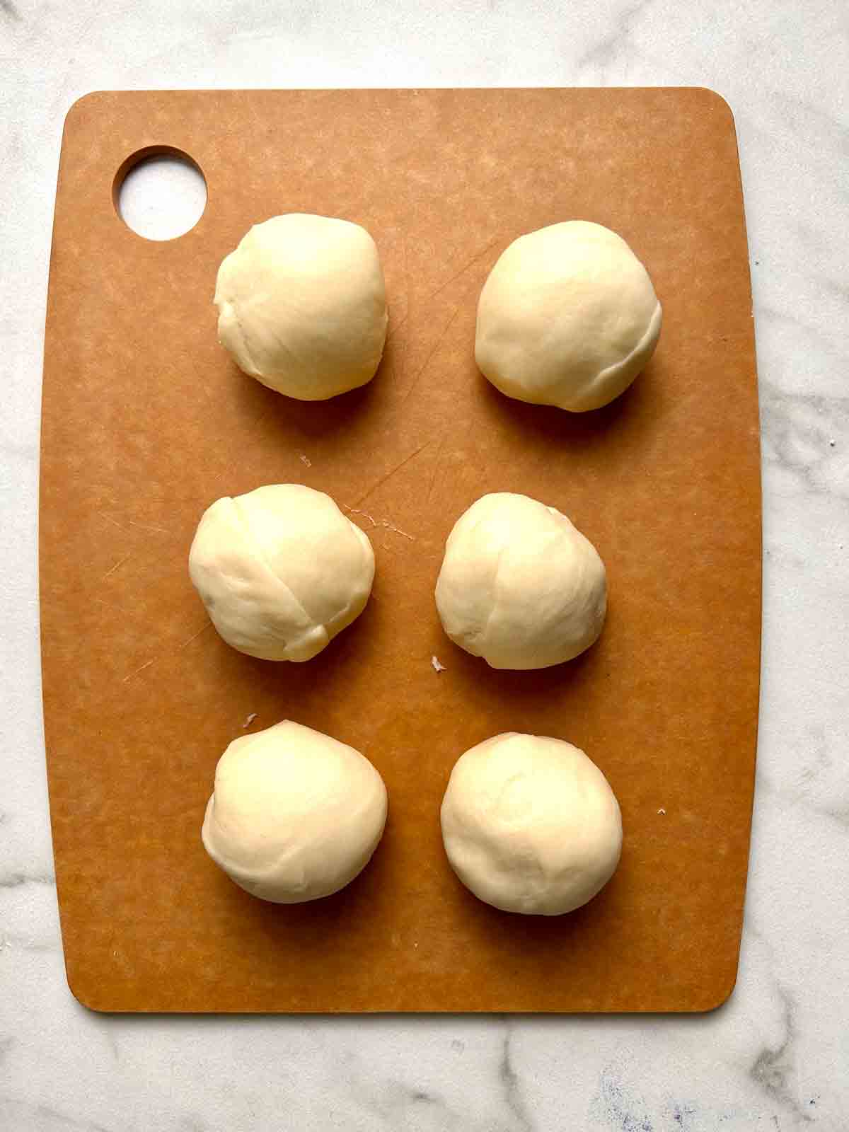dough divided into 6 pieces.