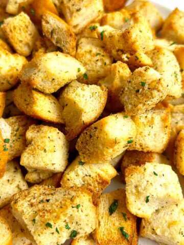 close up of air fryer croutons.