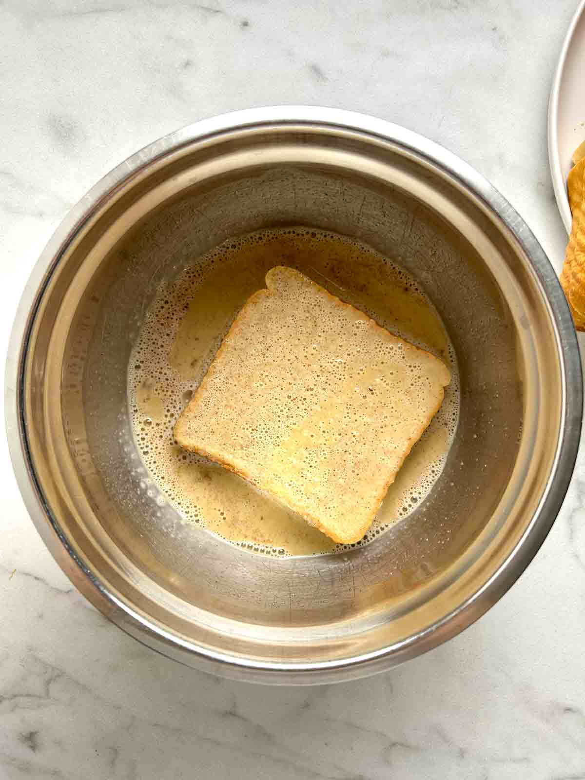 slice of bread dipped into egg custard.