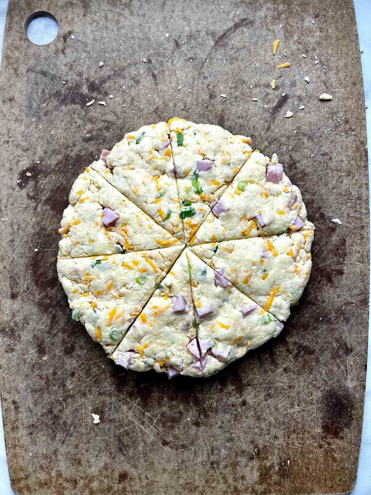 dough pressed into disc and cut into 8 wedges.