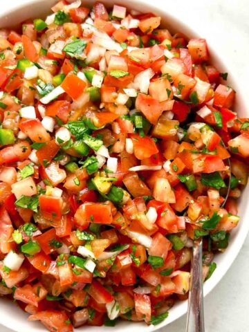 close up of pico de gallo in bowl.
