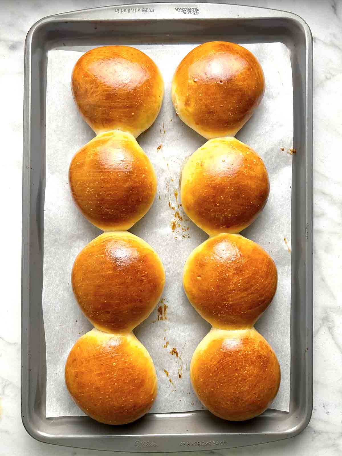 golden hamburger buns after baking.