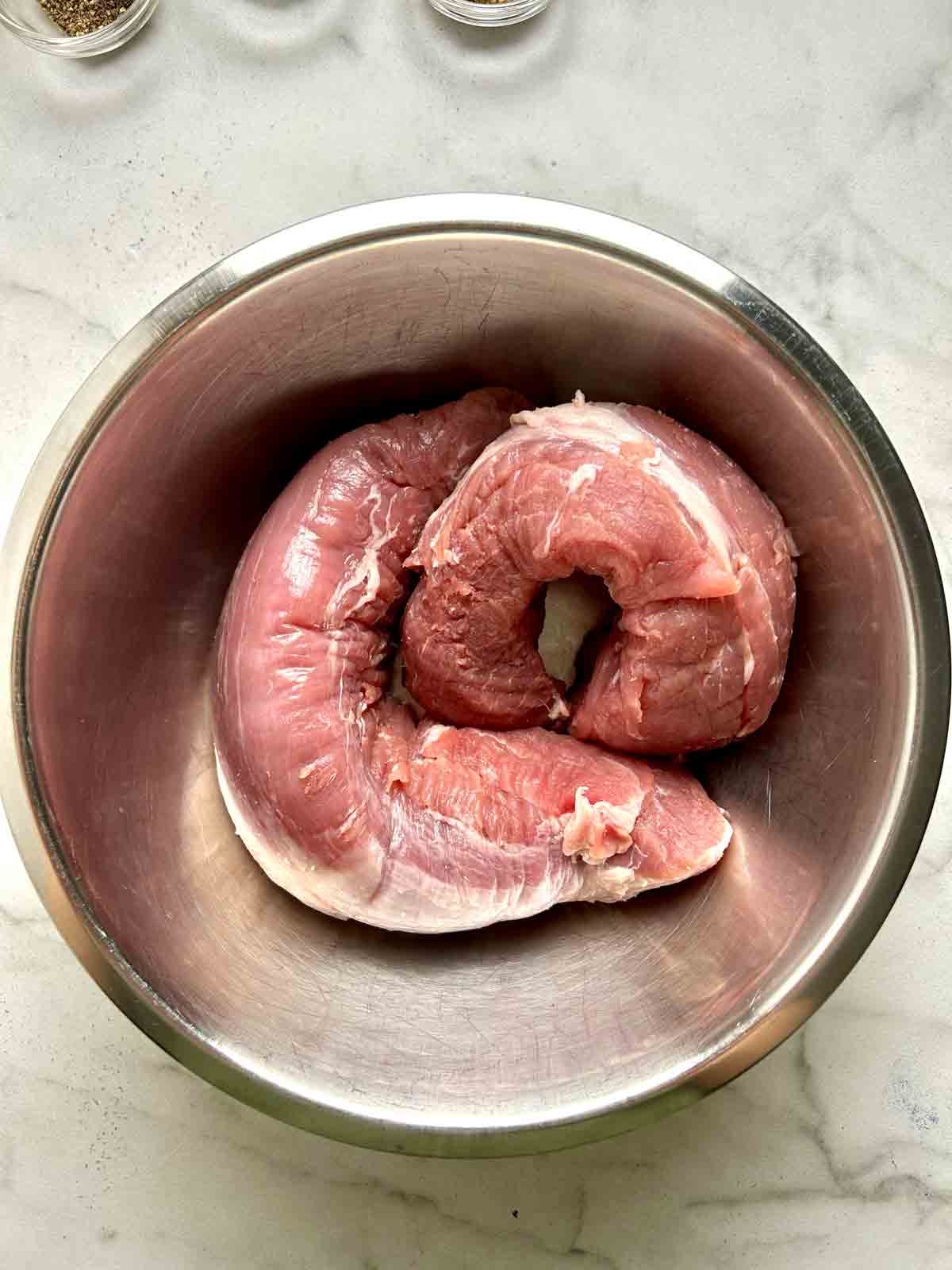 dried pork tenderloins sitting in bowl.