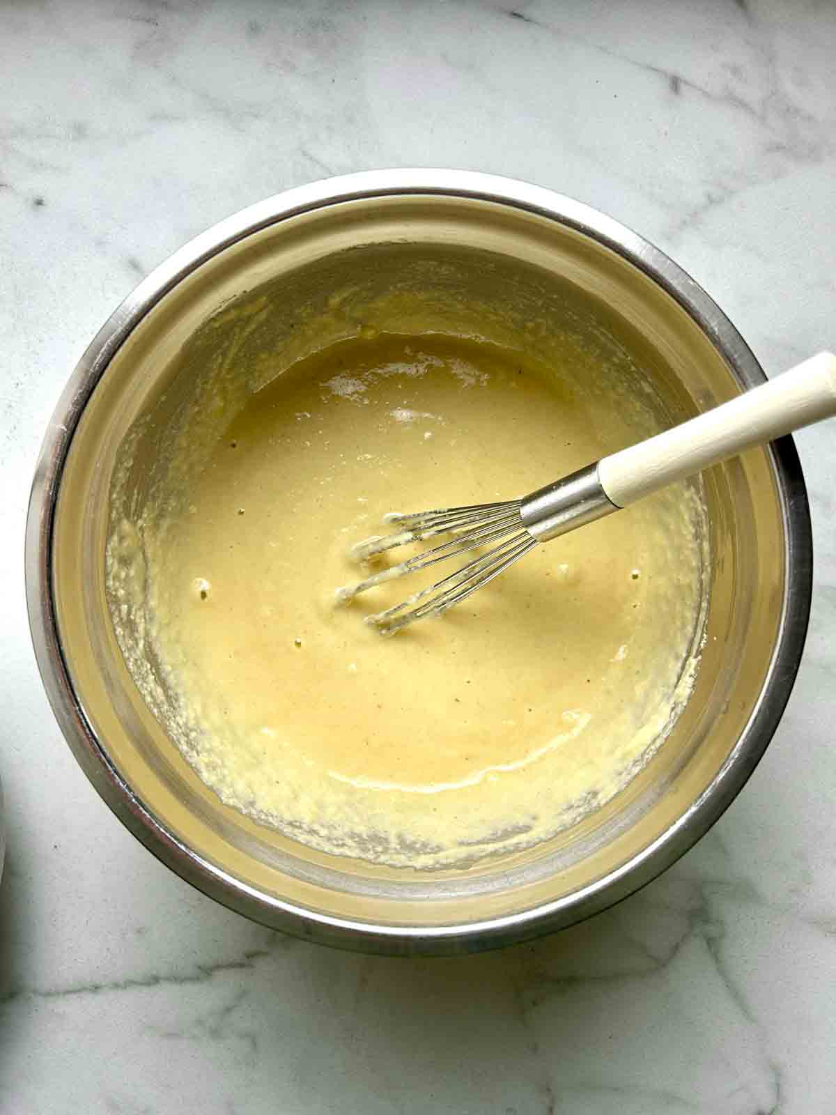 waffle batter whisked until smooth in bowl.