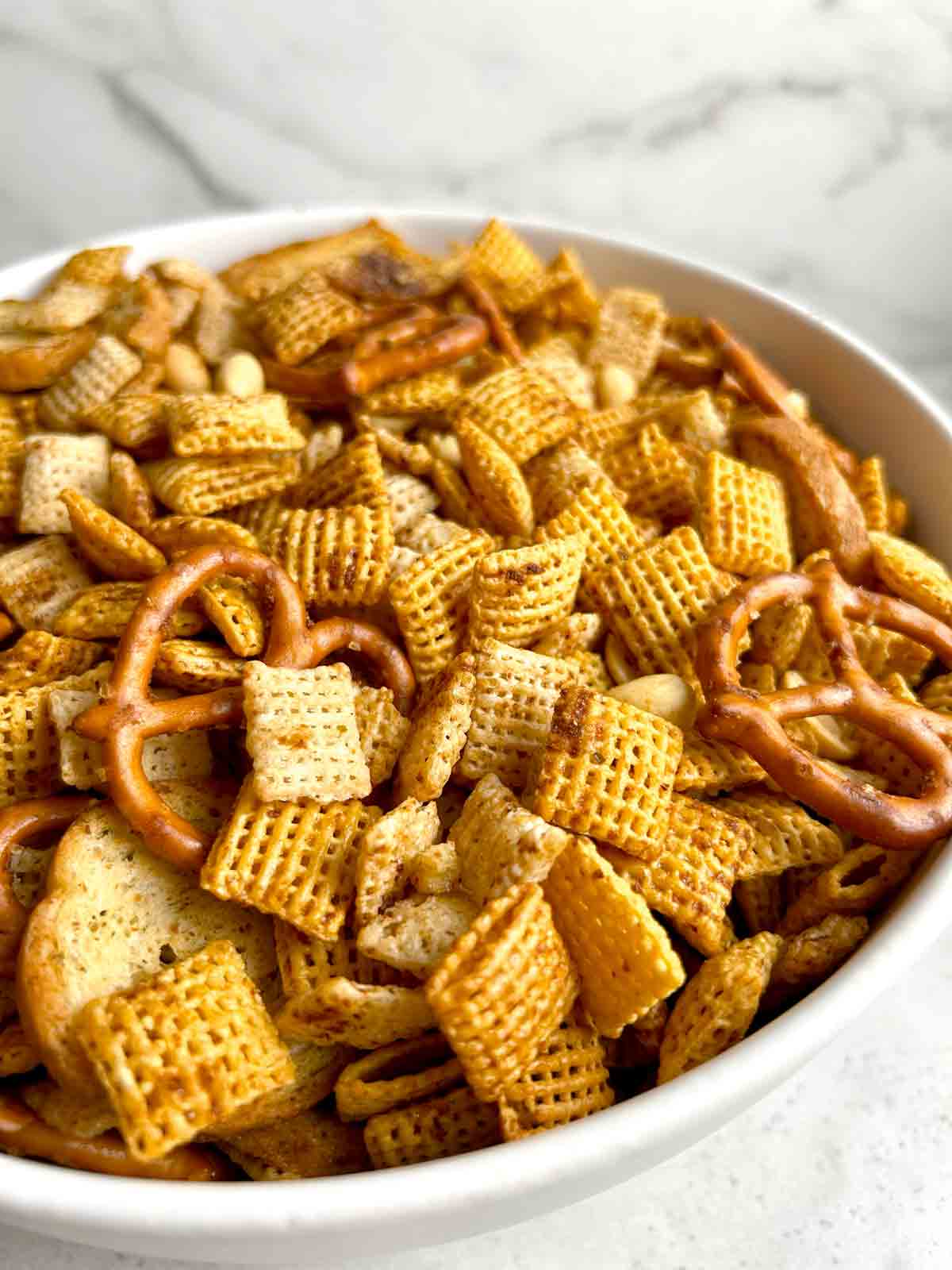 close up of bowl of Chex mix.