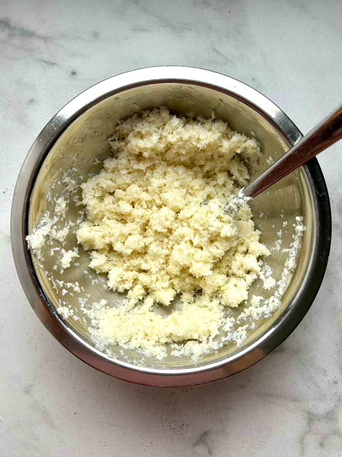 breadcrumbs soaked with milk in bowl.