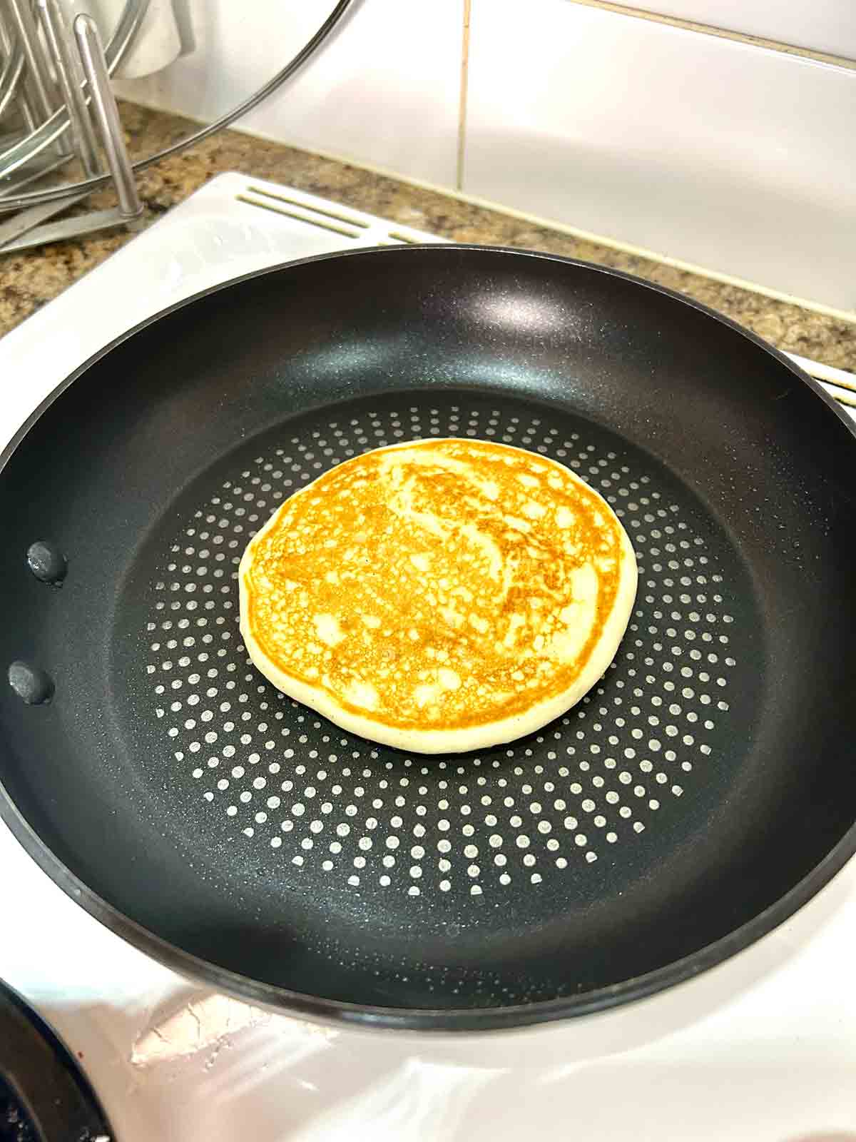 pancake golden brown after cooking for 2 minutes.